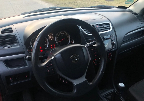 Suzuki Swift cena 23499 przebieg: 143979, rok produkcji 2012 z Czersk małe 631